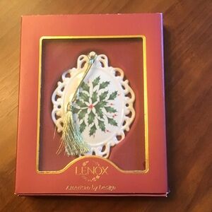 Lenox Holiday Cameo ornament with holly design and gold tassel